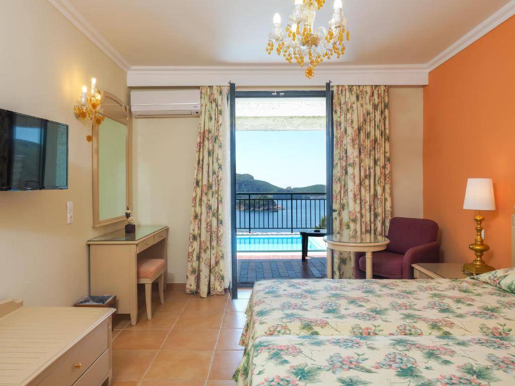 Postel nebo postele na pokoji v ubytování Paleo ArtNouveau Hotel - Adults Only
