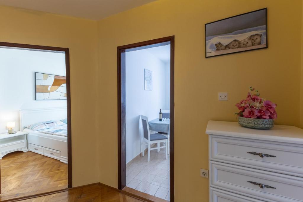 Postel nebo postele na pokoji v ubytování Apartments Dado