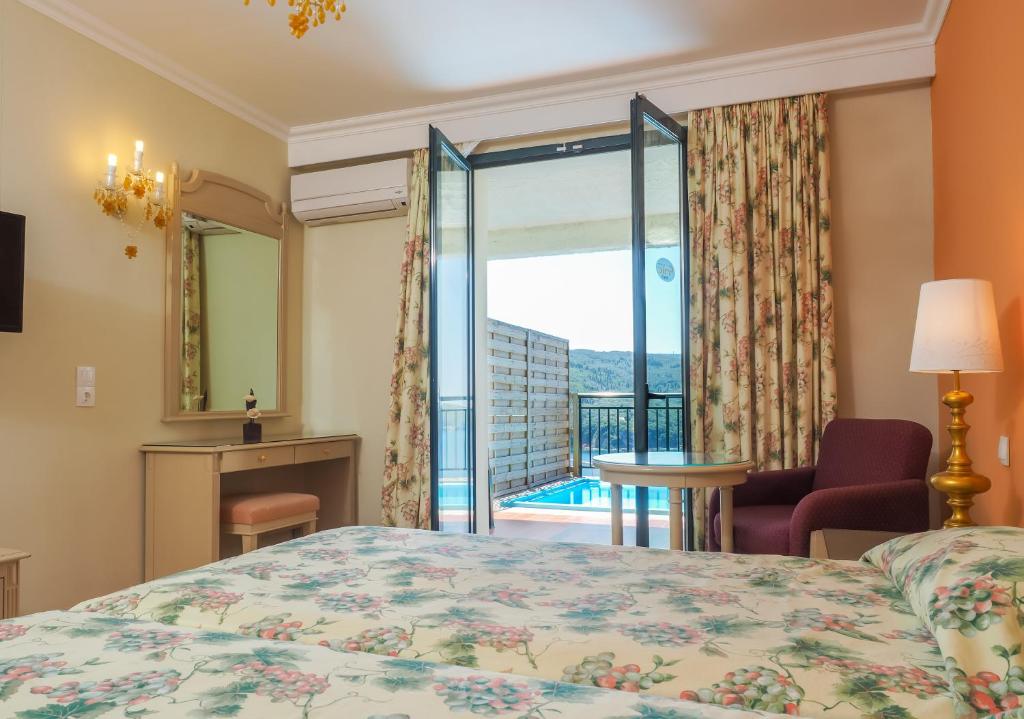 Postel nebo postele na pokoji v ubytování Paleo ArtNouveau Hotel - Adults Only
