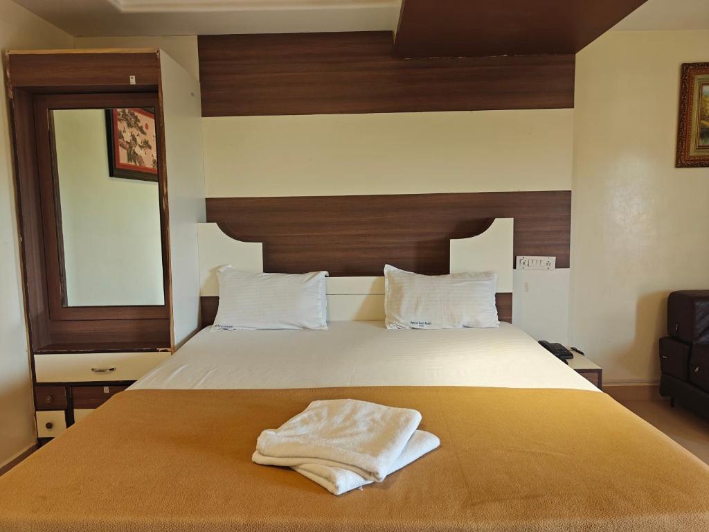 Postel nebo postele na pokoji v ubytování Park Inn Beach Resort
