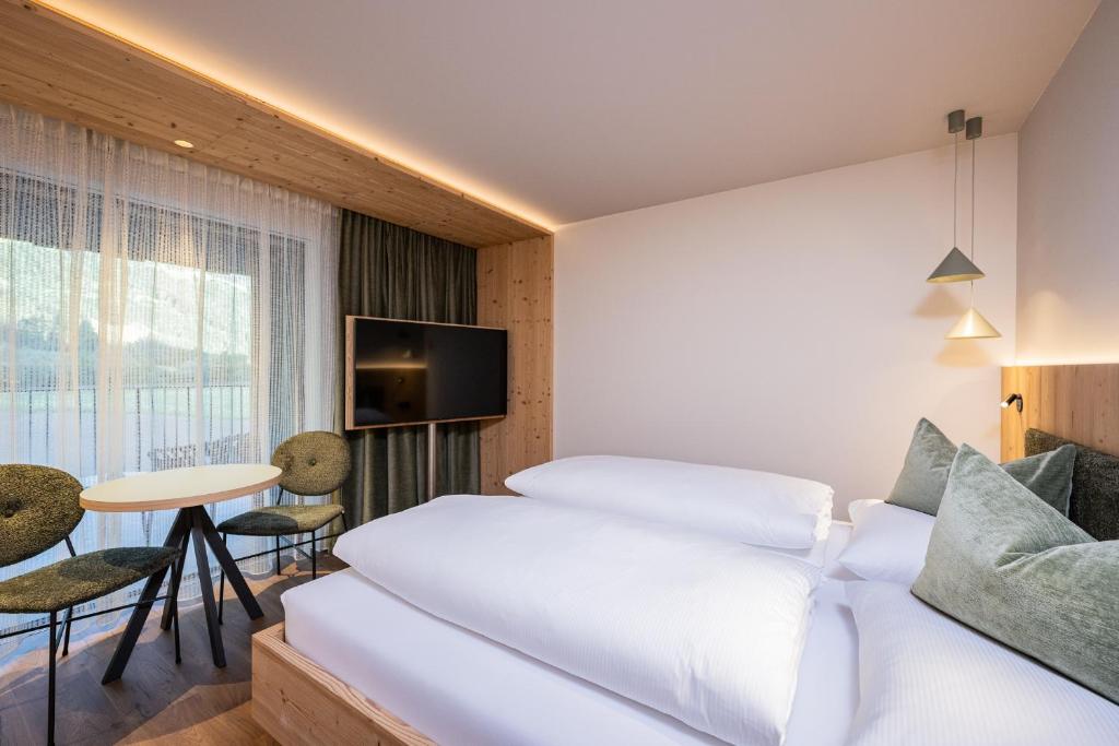 Postel nebo postele na pokoji v ubytování Hotel Anewandter