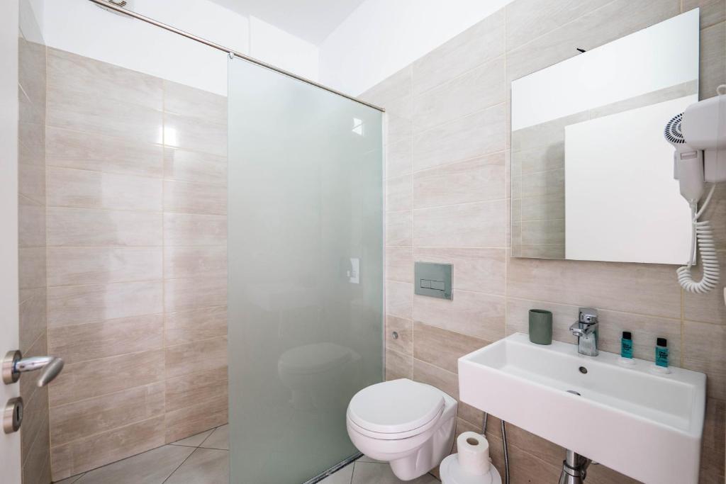 Un baño de Sunshine Hotel