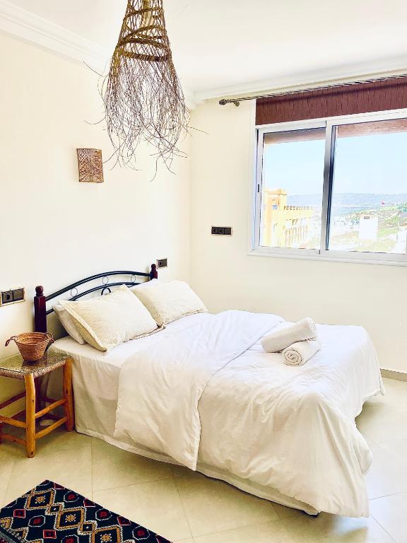 Postel nebo postele na pokoji v ubytování Waveside Hostel