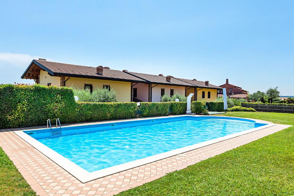 Bazén v ubytovaní Alessandra 2 Apartment by Wonderful Italy alebo v jeho blízkosti