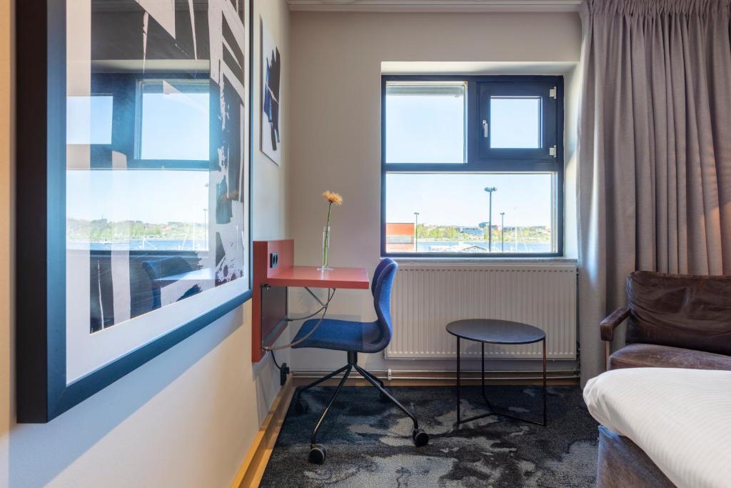 Postel nebo postele na pokoji v ubytování Home Hotel Carlscrona