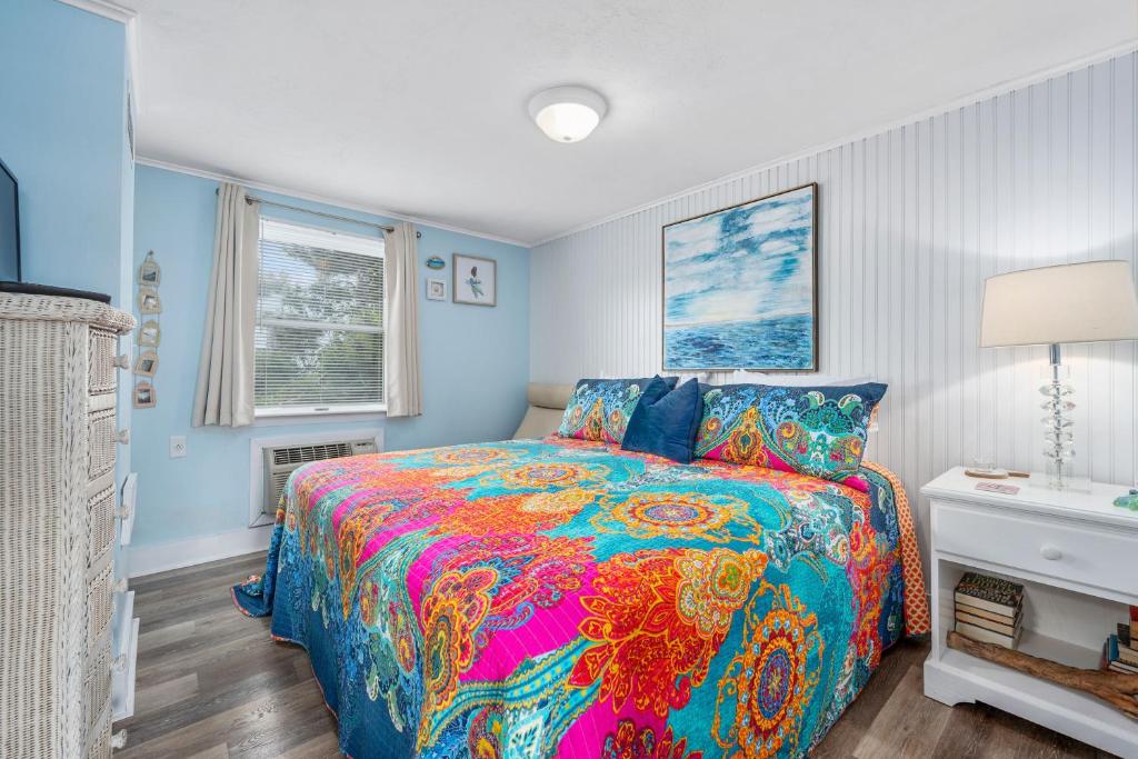 Voodi või voodid majutusasutuse Oceanside Condos toas