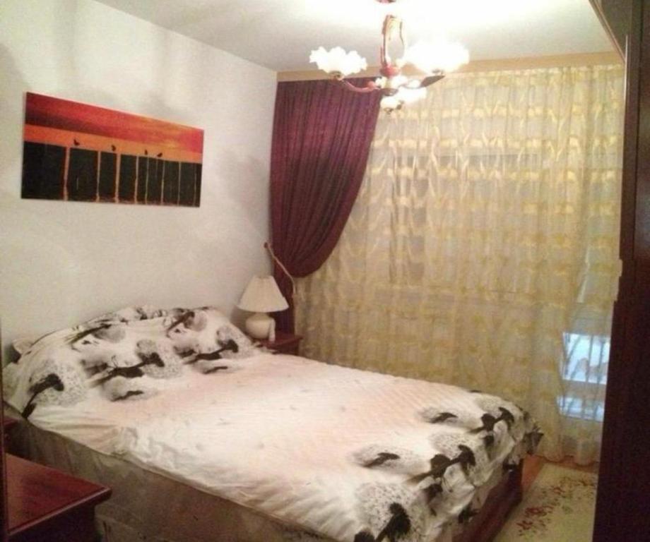 Postel nebo postele na pokoji v ubytování Apartament 2 camere