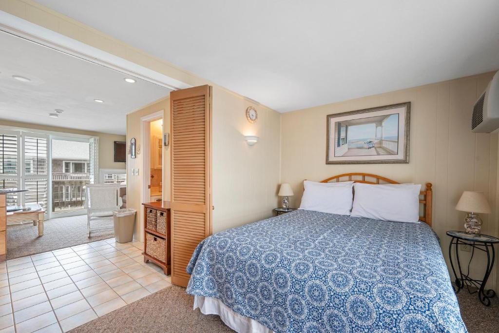Voodi või voodid majutusasutuse Oceanside Condos toas