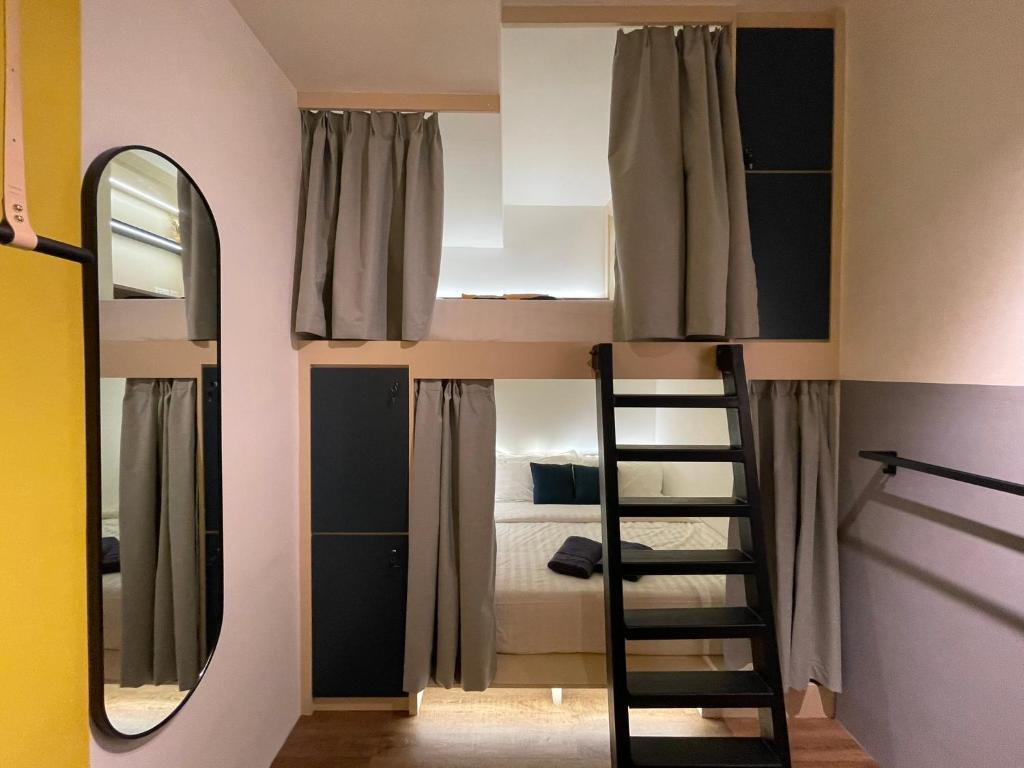 Voodi või voodid majutusasutuse Faloe Hostel toas
