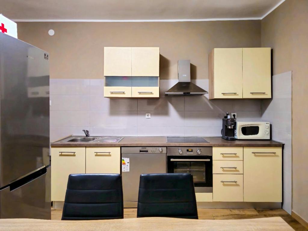 Kuchyňa alebo kuchynka v ubytovaní Family-friendly apartments with swimming pools Bibinje, Zadar - 5778