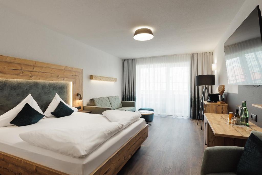 Posteľ alebo postele v izbe v ubytovaní Hotel Kohlerhof