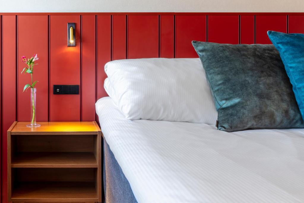Postel nebo postele na pokoji v ubytování Home Hotel Carlscrona