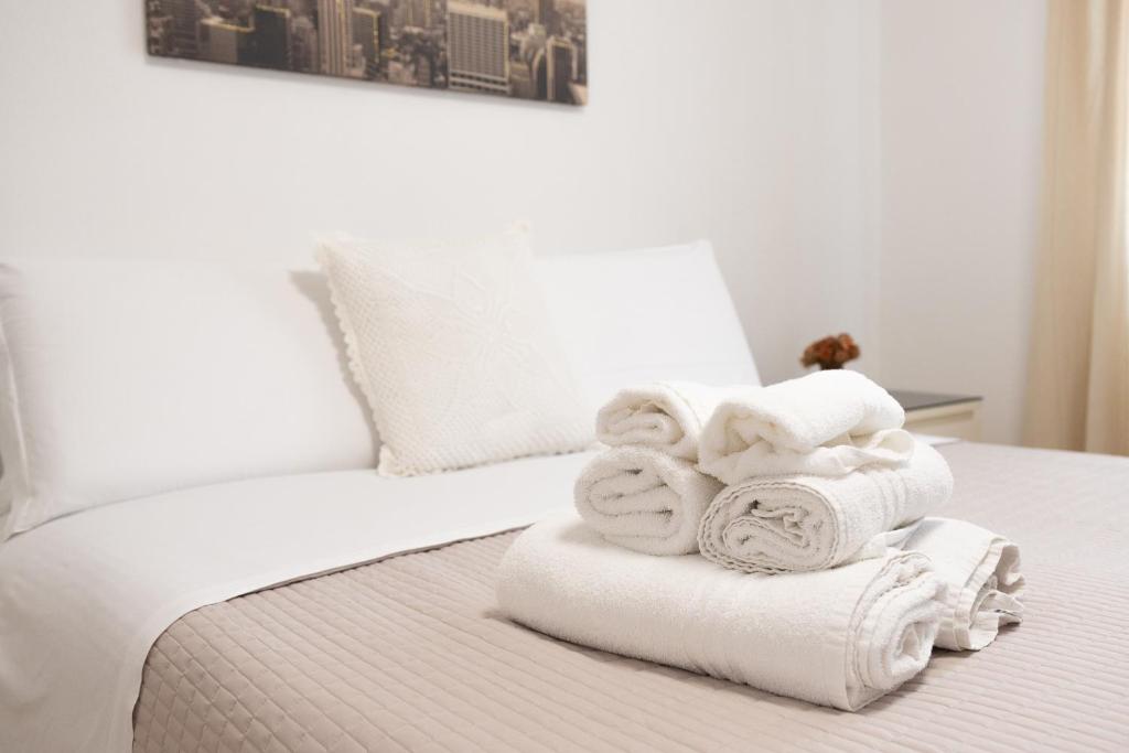 Postel nebo postele na pokoji v ubytování Alba apartments
