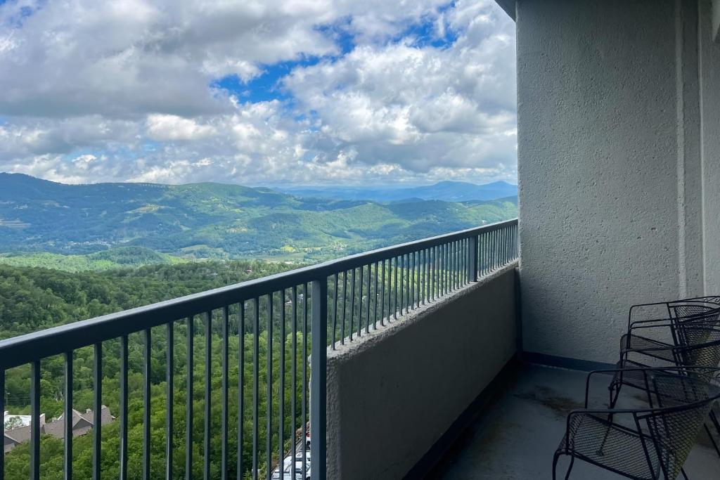 a balcony with a view of the mountains at 303 Sugar Top Dr #2901 in Sugar Mountain