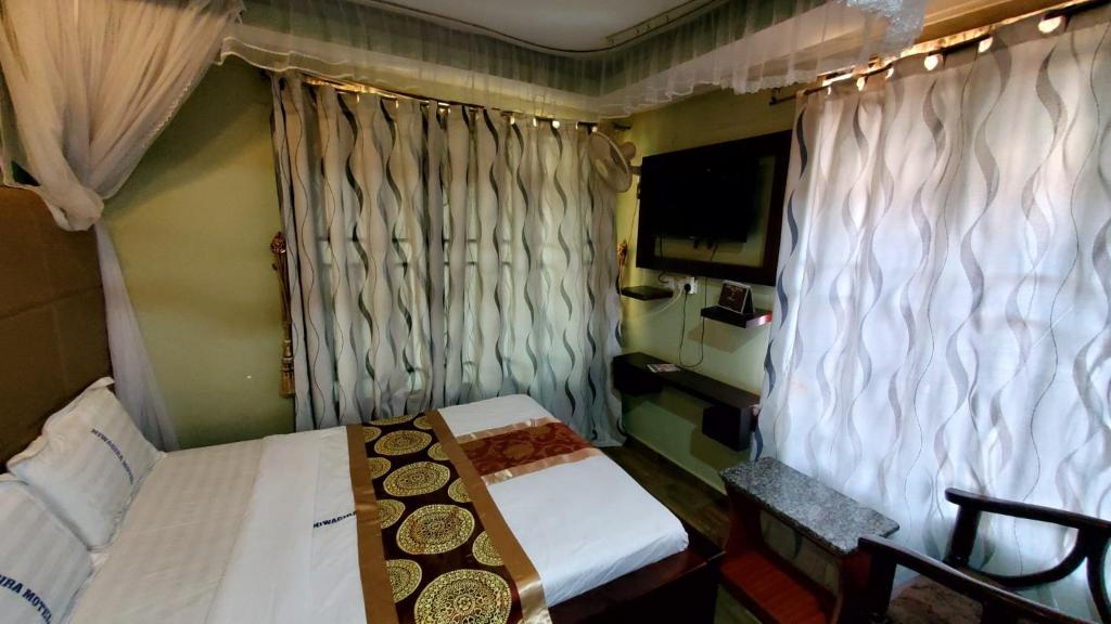 Postel nebo postele na pokoji v ubytování Chello Suites