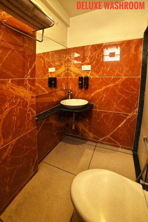 Koupelna v ubytování Hotel Amrta
