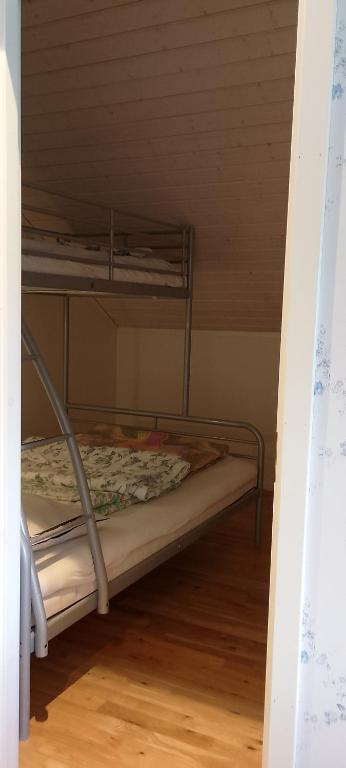 Postel nebo postele na pokoji v ubytování Tess på Nöddö