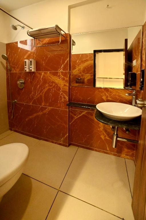 Koupelna v ubytování Hotel Amrta