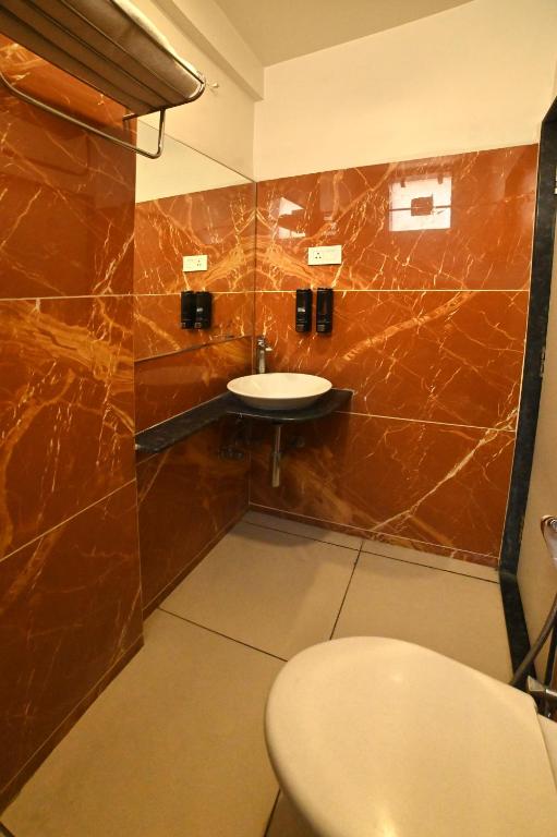 Koupelna v ubytování Hotel Amrta