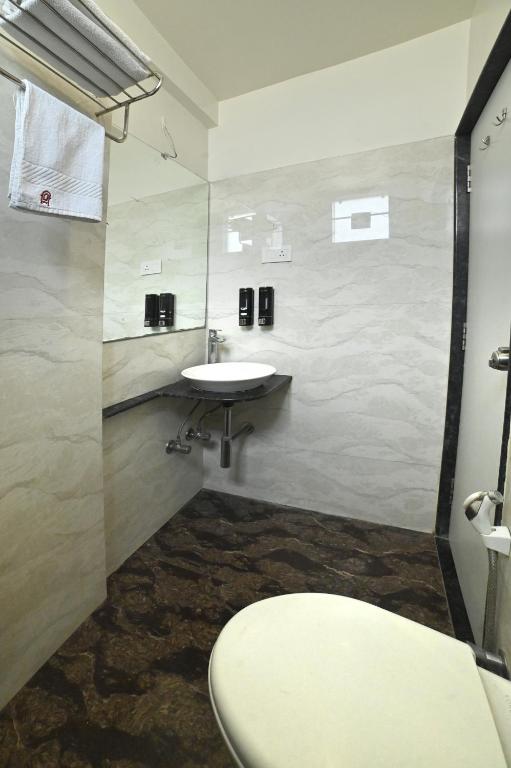 Koupelna v ubytování Hotel Amrta