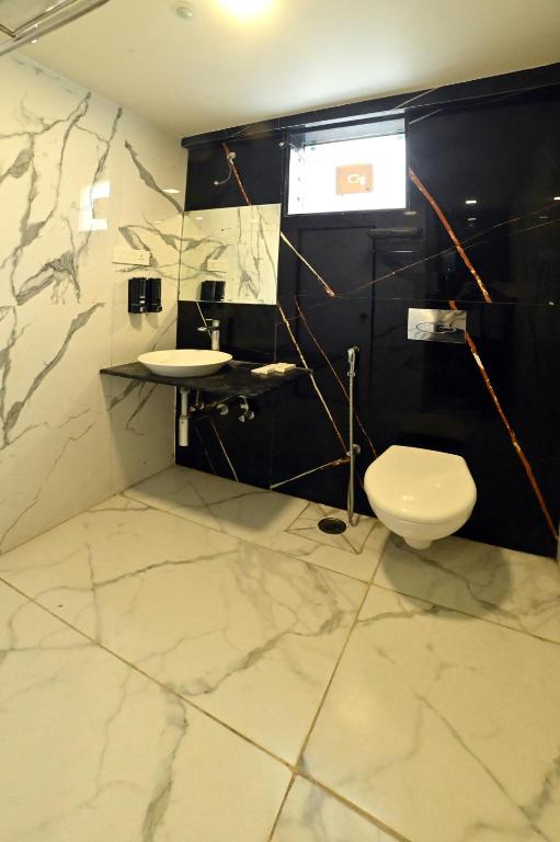 Koupelna v ubytování Hotel Amrta