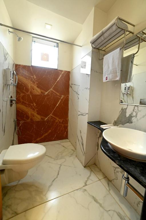 Koupelna v ubytování Hotel Amrta