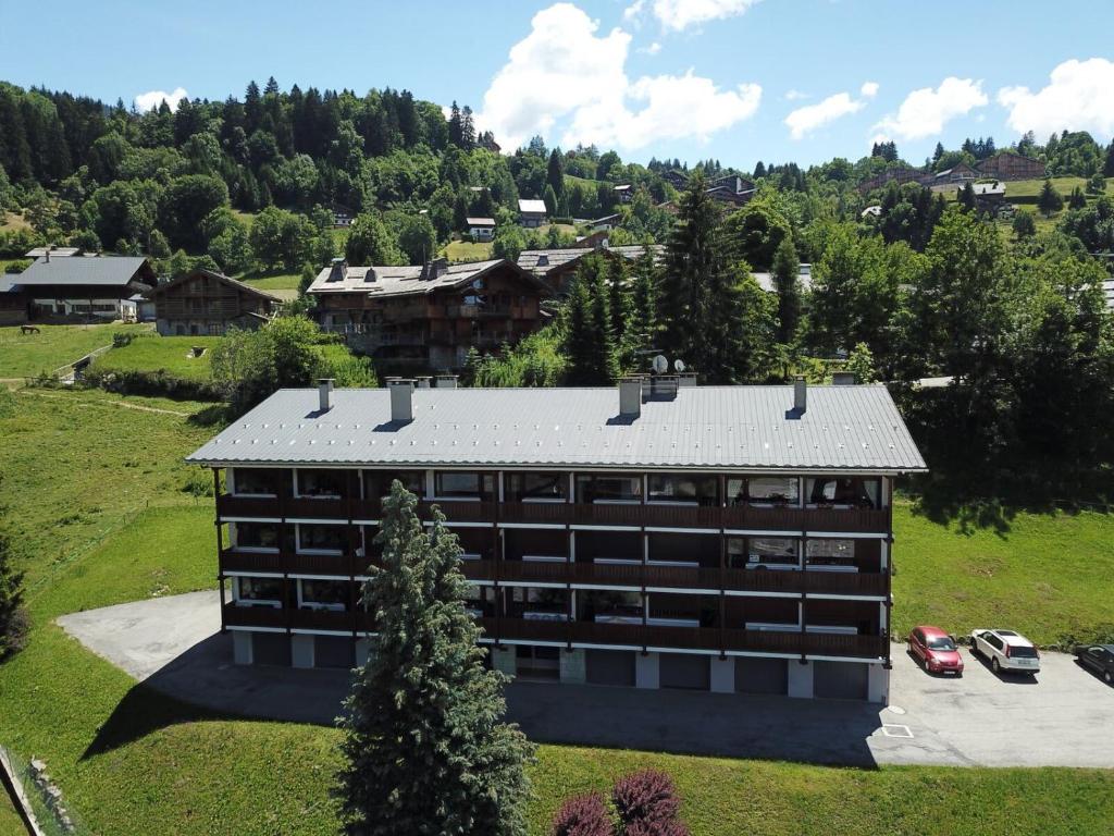 an overhead view of a building with a roof at Résidence Le Relax - Megève Centre in Megève