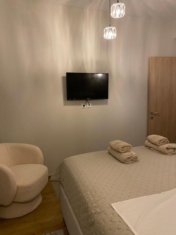 Postel nebo postele na pokoji v ubytování Zeus Residence by Elysium Collection