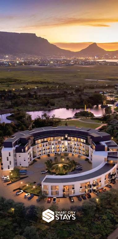 an aerial view of a building with a parking lot at On Park by Smart City Stays in Cape Town