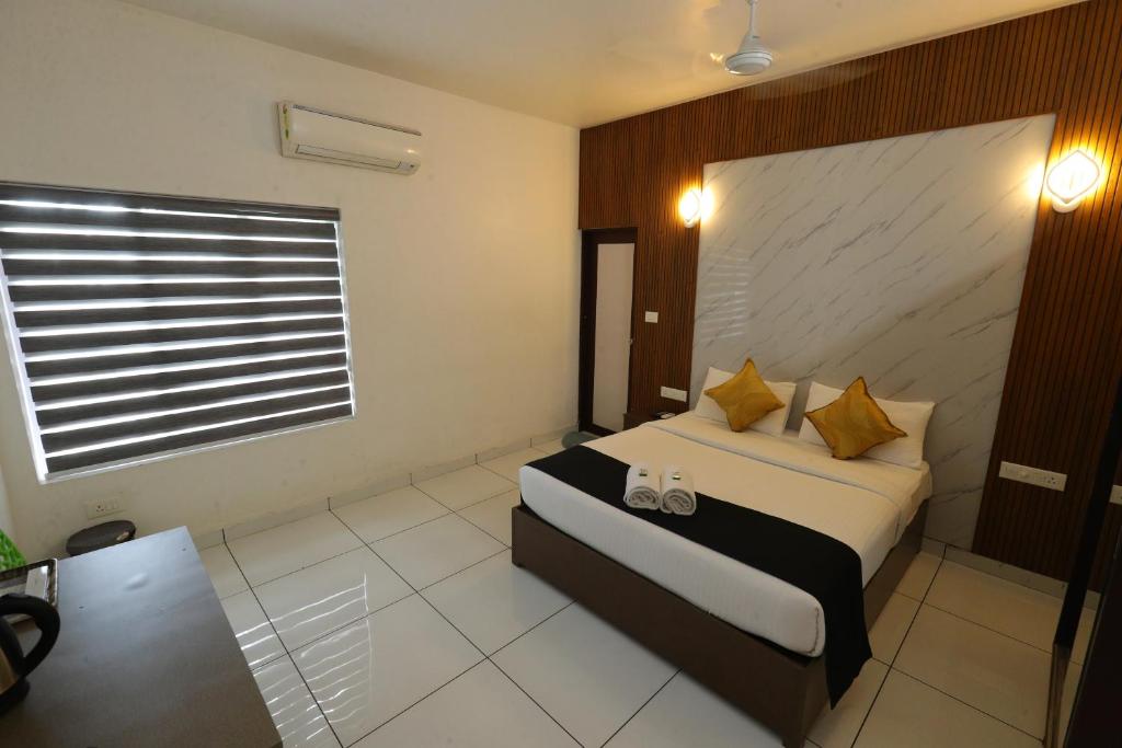 Postel nebo postele na pokoji v ubytování D-Green Hotels