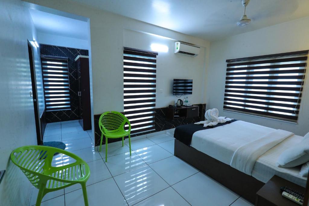 Postel nebo postele na pokoji v ubytování D-Green Hotels