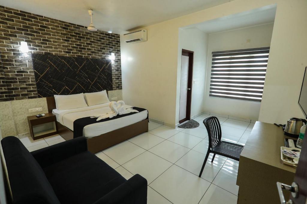 Postel nebo postele na pokoji v ubytování D-Green Hotels