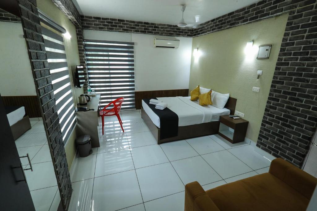 Postel nebo postele na pokoji v ubytování D-Green Hotels