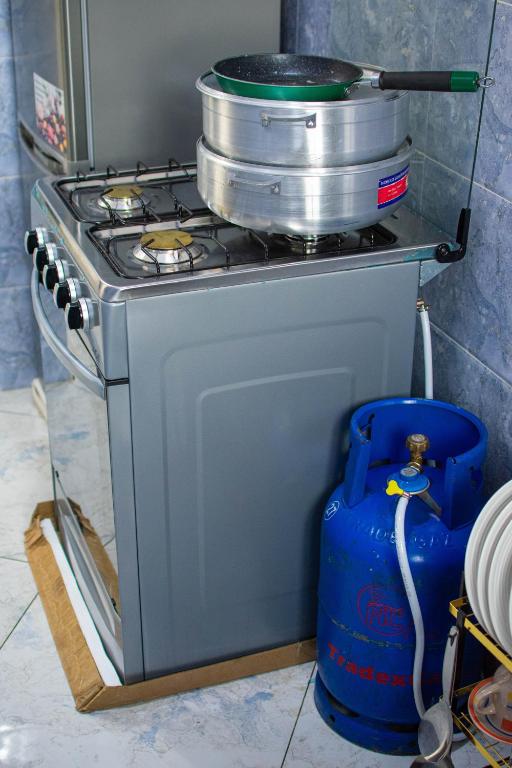 Kuchyň nebo kuchyňský kout v ubytování Appartement meublé Nsam