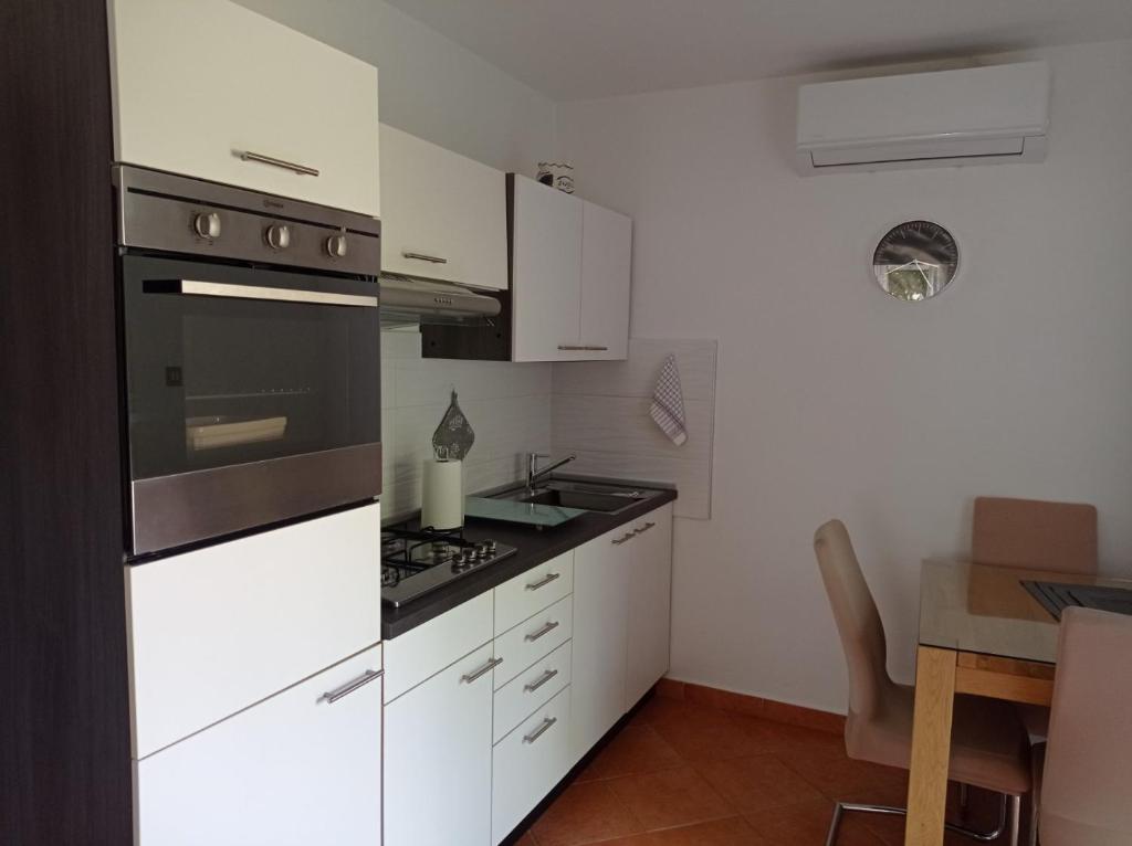 Kuchyň nebo kuchyňský kout v ubytování Apartman Tar