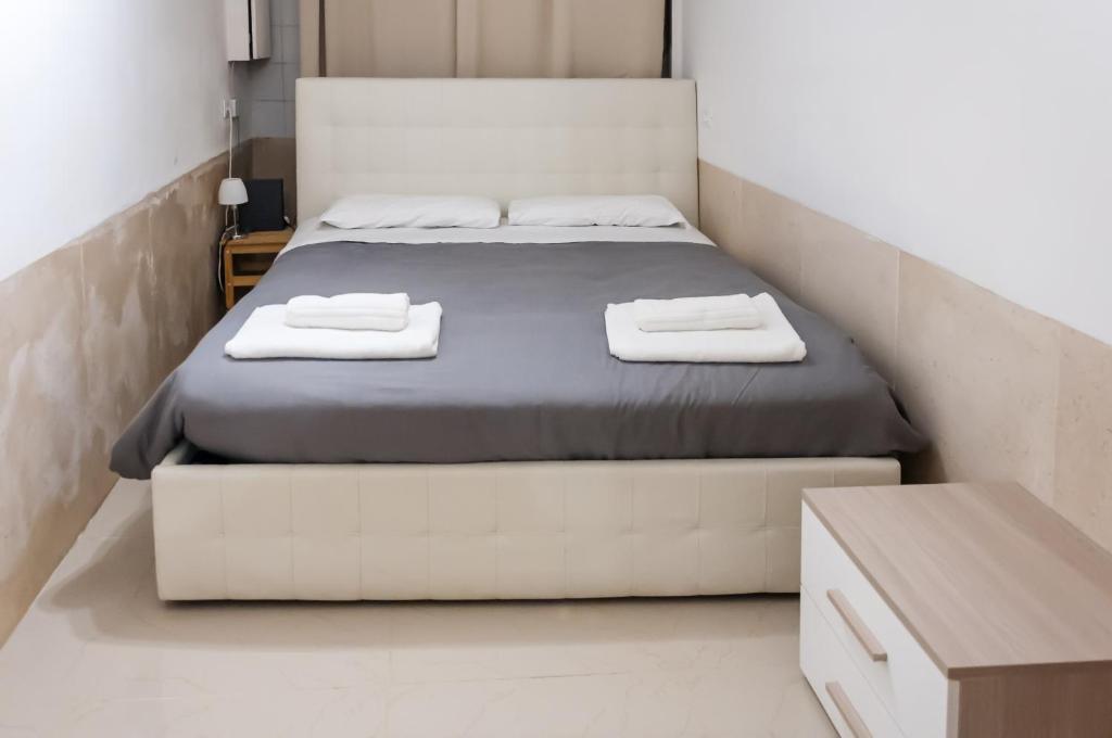 Ένα ή περισσότερα κρεβάτια σε δωμάτιο στο room with private bathroom Stella 1