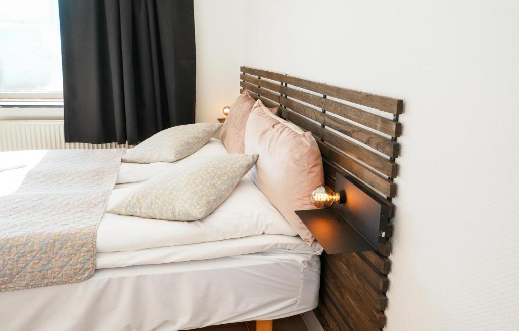 Postel nebo postele na pokoji v ubytování Hotel Falken