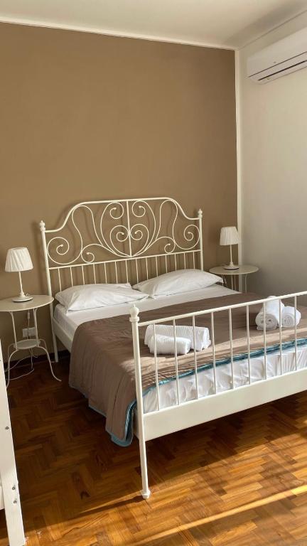 Postel nebo postele na pokoji v ubytování A I R Sorrento House