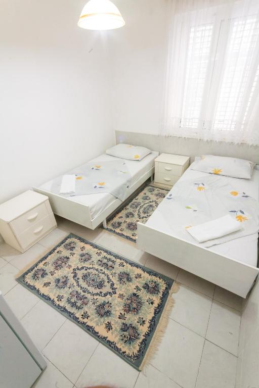 Postel nebo postele na pokoji v ubytování Rooms Molabeciri