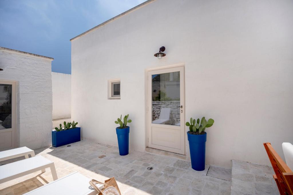 Fotografie z fotogalerie ubytování Trulli Lithos Suite v Alberobellu
