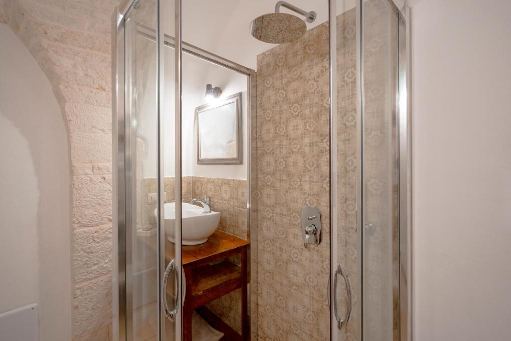 Koupelna v ubytování Trulli Lithos Suite