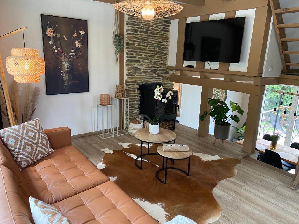 TV a/nebo společenská místnost v ubytování Romantik Wood