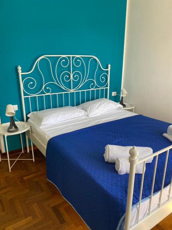 Postel nebo postele na pokoji v ubytování A I R Sorrento House