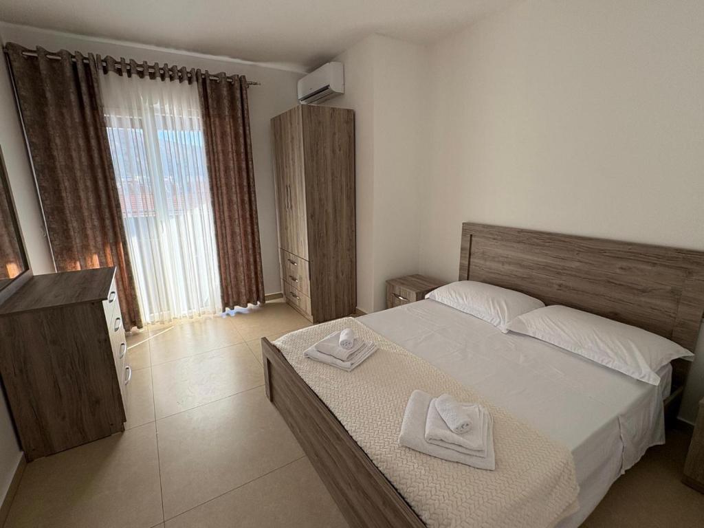 A bed or beds in a room at MEGAN RESIDENCE - floor 3