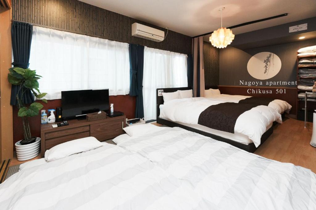 Postel nebo postele na pokoji v ubytování Prosper 5th bldg 501