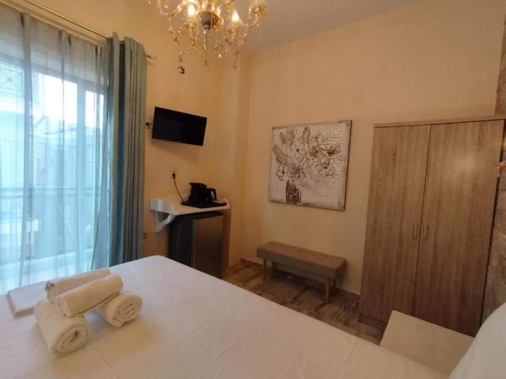 Postel nebo postele na pokoji v ubytování Faros