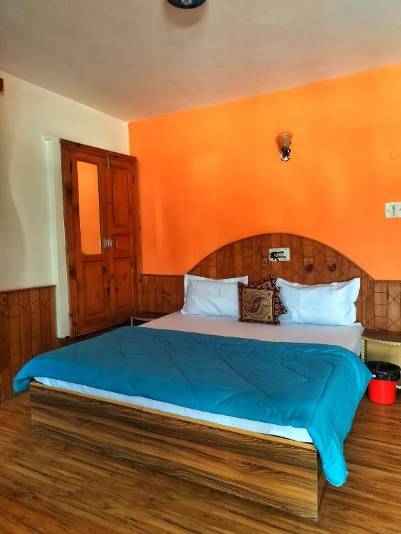 Postel nebo postele na pokoji v ubytování Joeys Hostel Manali