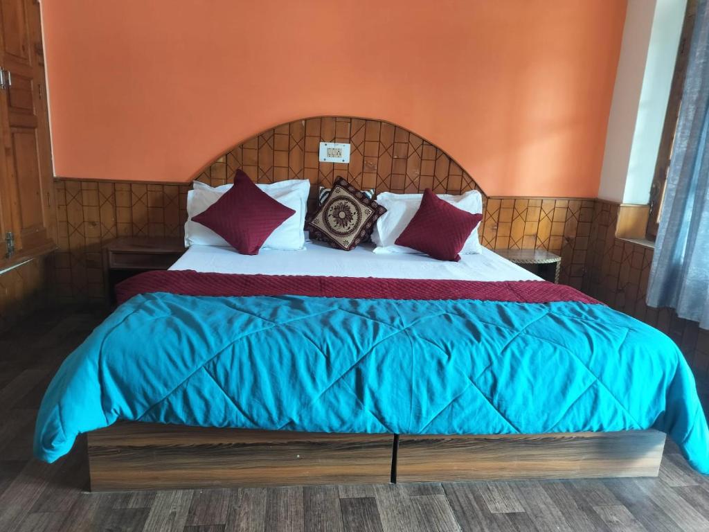 Postel nebo postele na pokoji v ubytování Joeys Hostel Manali