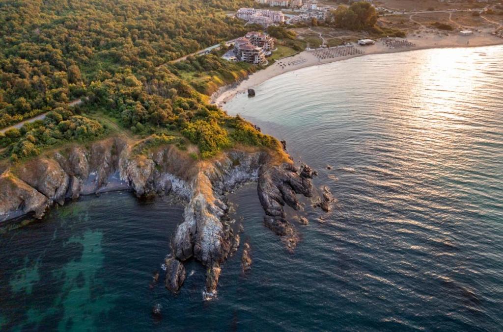 an aerial view of an island in the water at Sand Lillies Sunny Relax in Sozopol