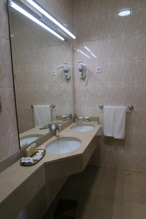 Koupelna v ubytování Hotel Toural